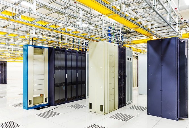 Rows of IT equipment and servers inside a data center